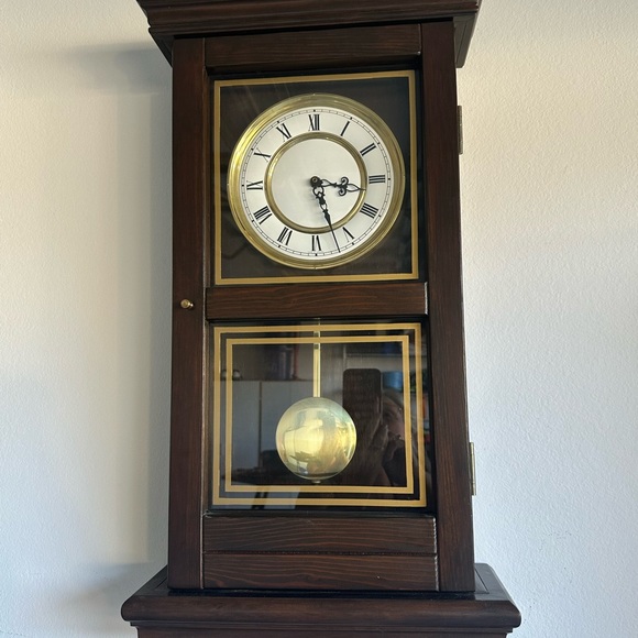 Classic Brown Wall Clock with Gold Accents
